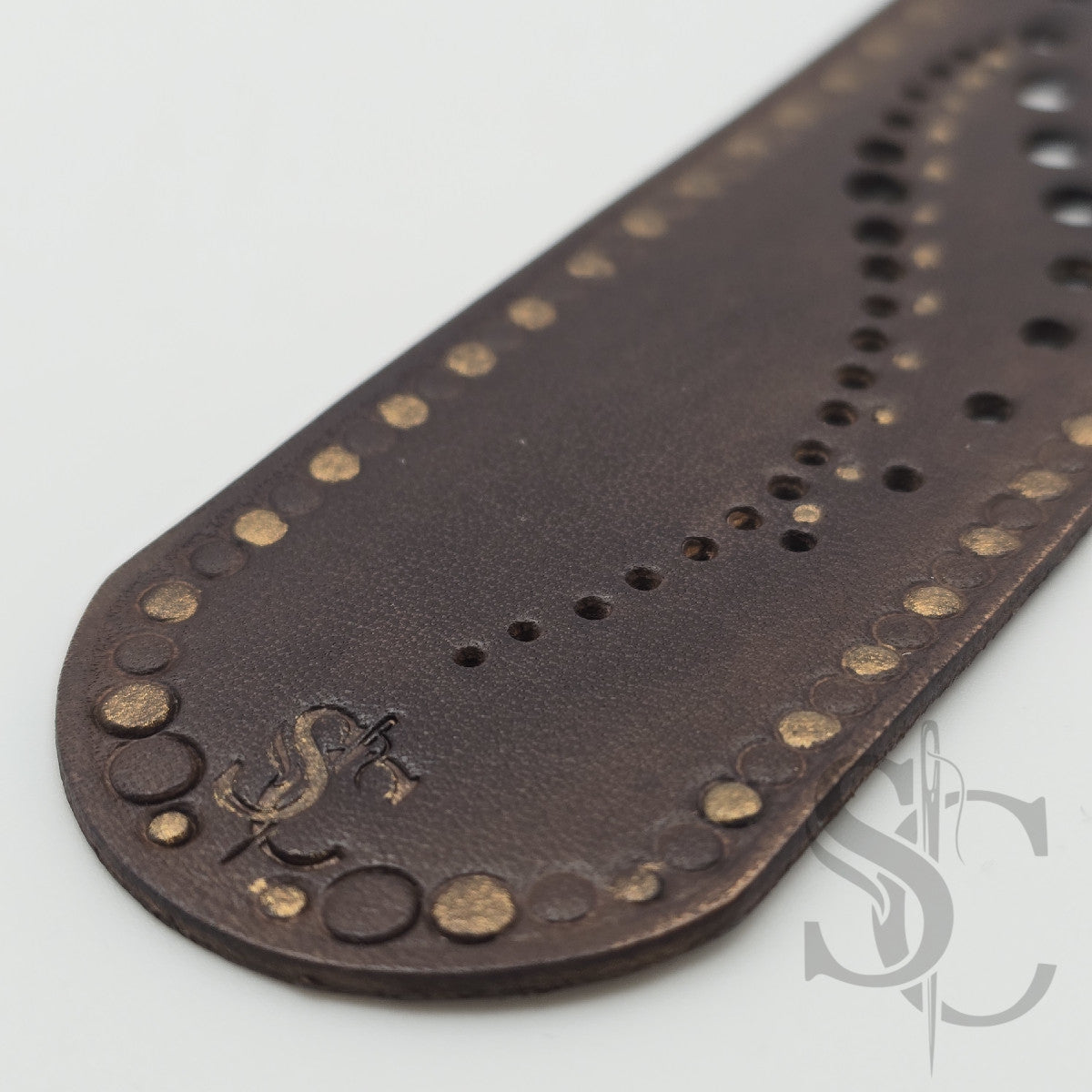 Marque page de vide en bulles de bronze
