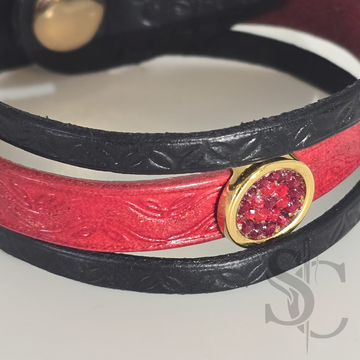 Bracelet 3 brins rouge et doré vagues