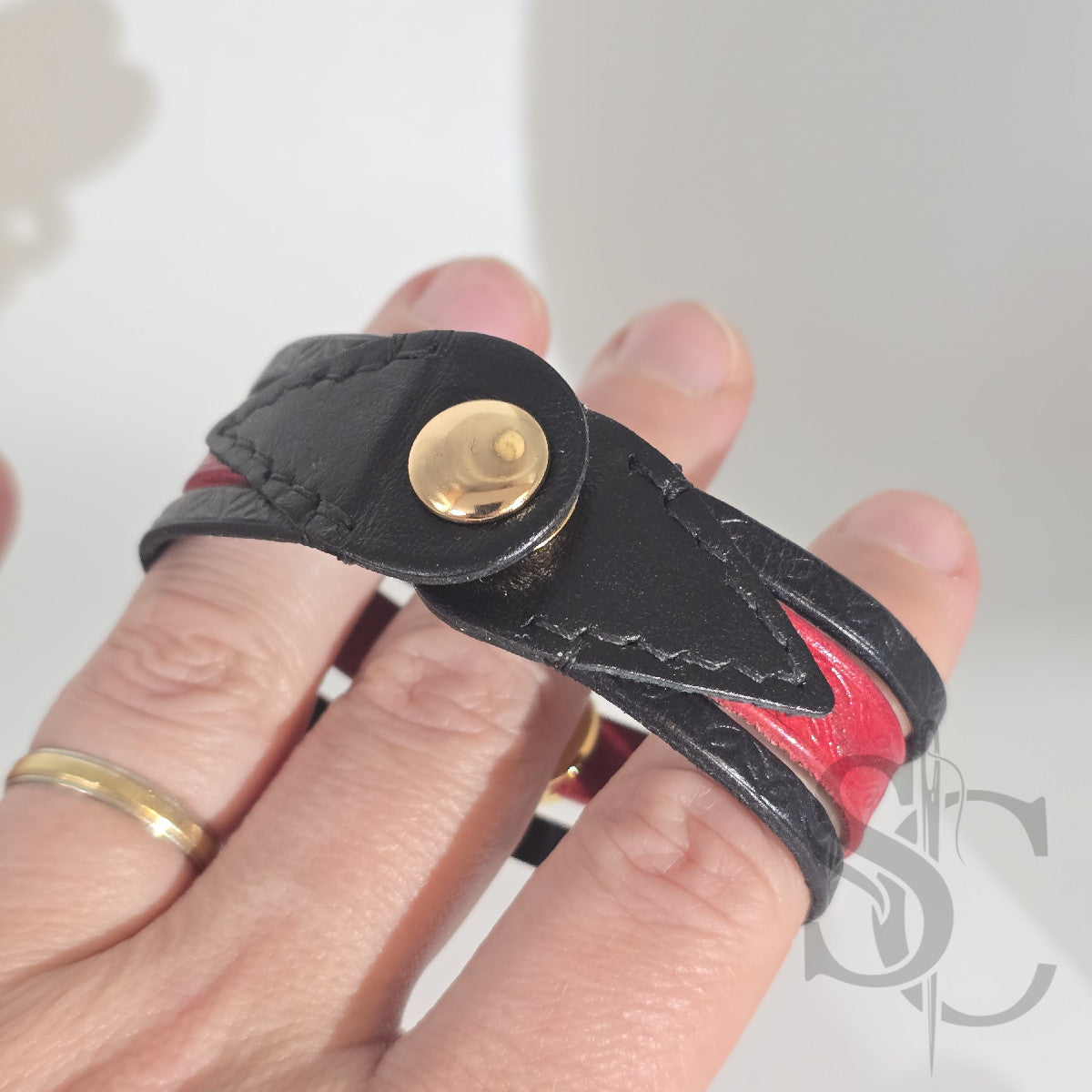 Bracelet 3 brins rouge et doré vagues