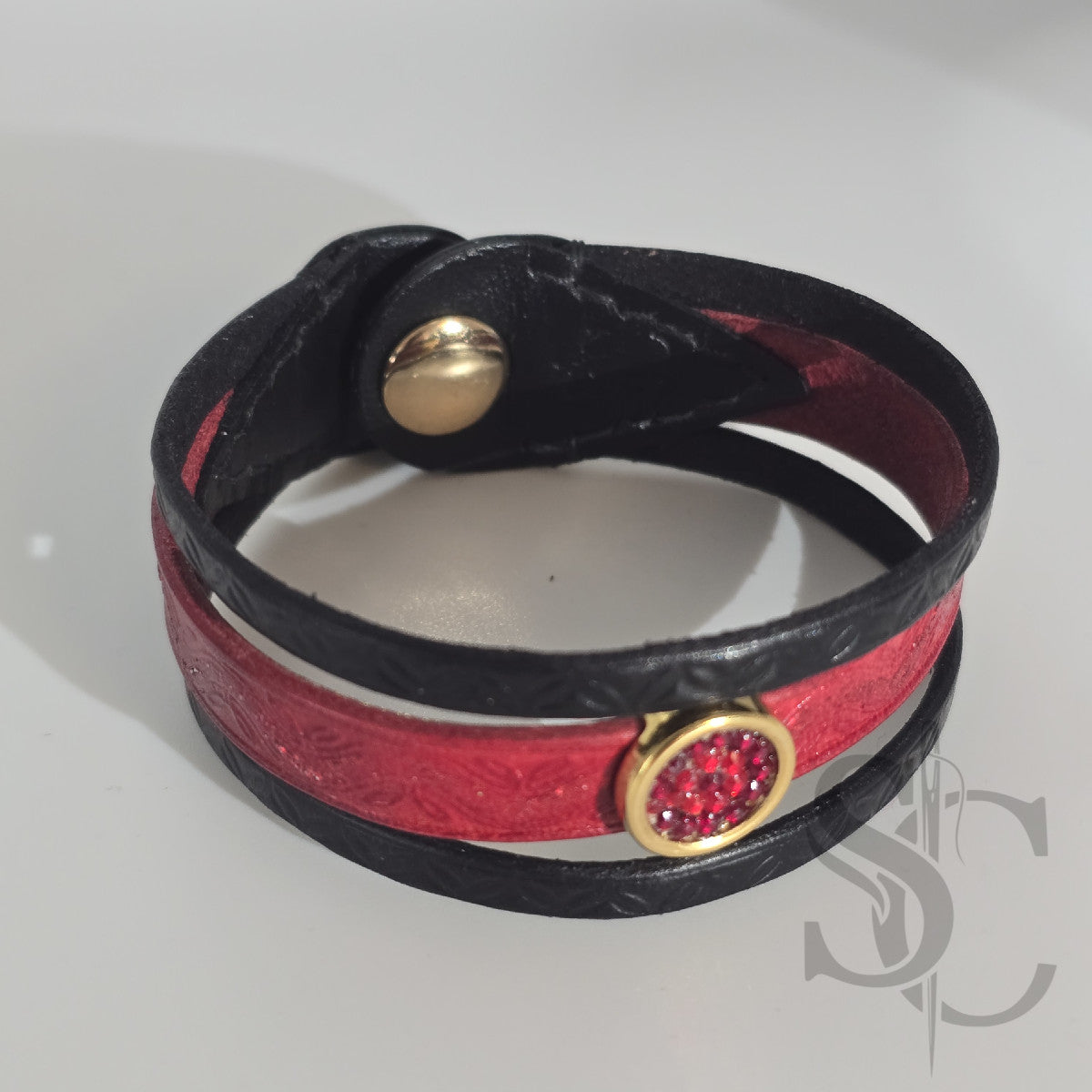 Bracelet 3 brins rouge et doré vagues