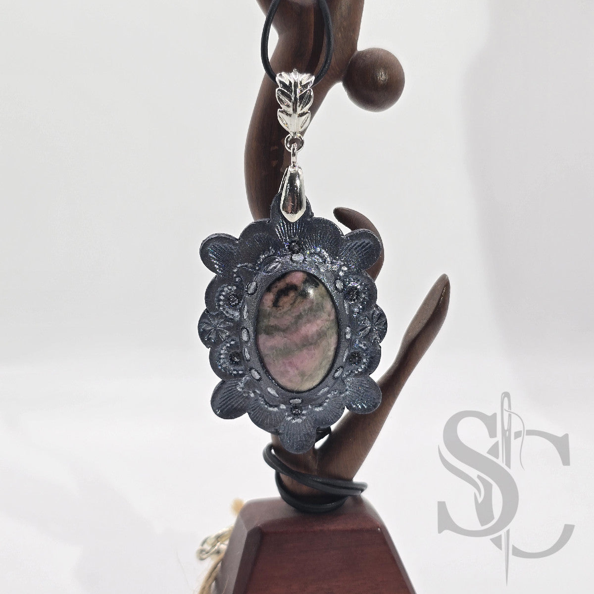 Pendentif étoile avec rhodonite