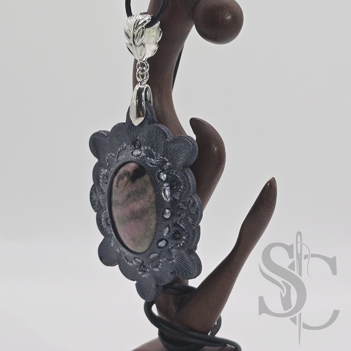 Pendentif étoile avec rhodonite