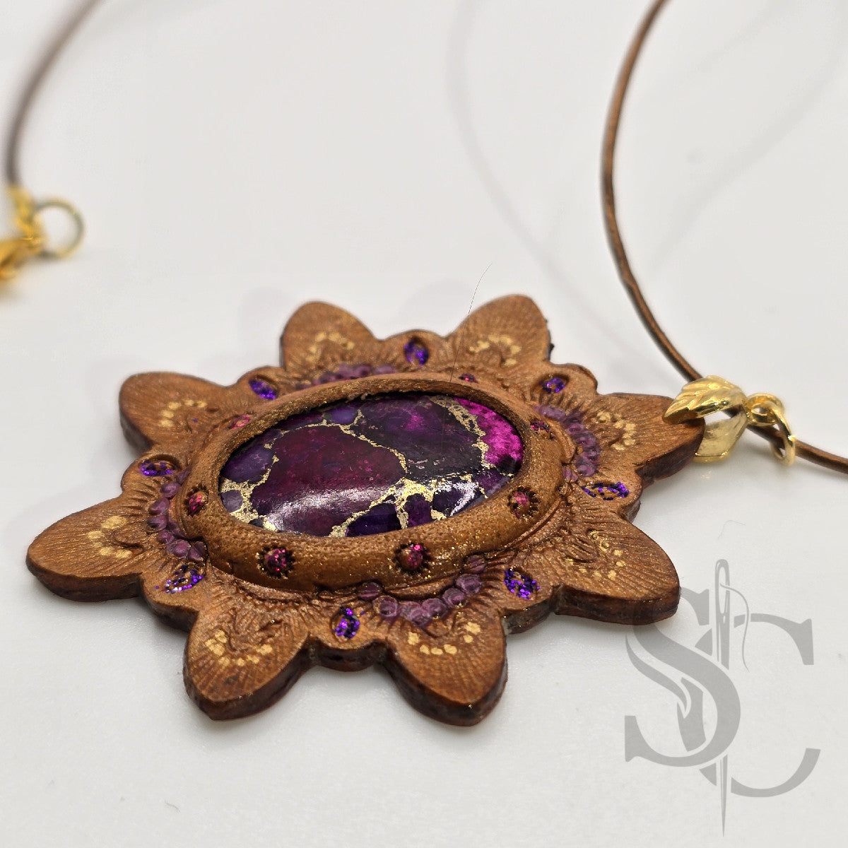 Pendentif étoile avec turquoise et cuivre violet