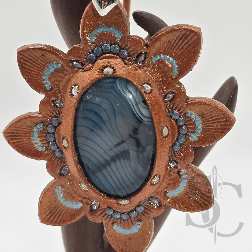 Pendentif étoile avec agate veine de dragon bleue