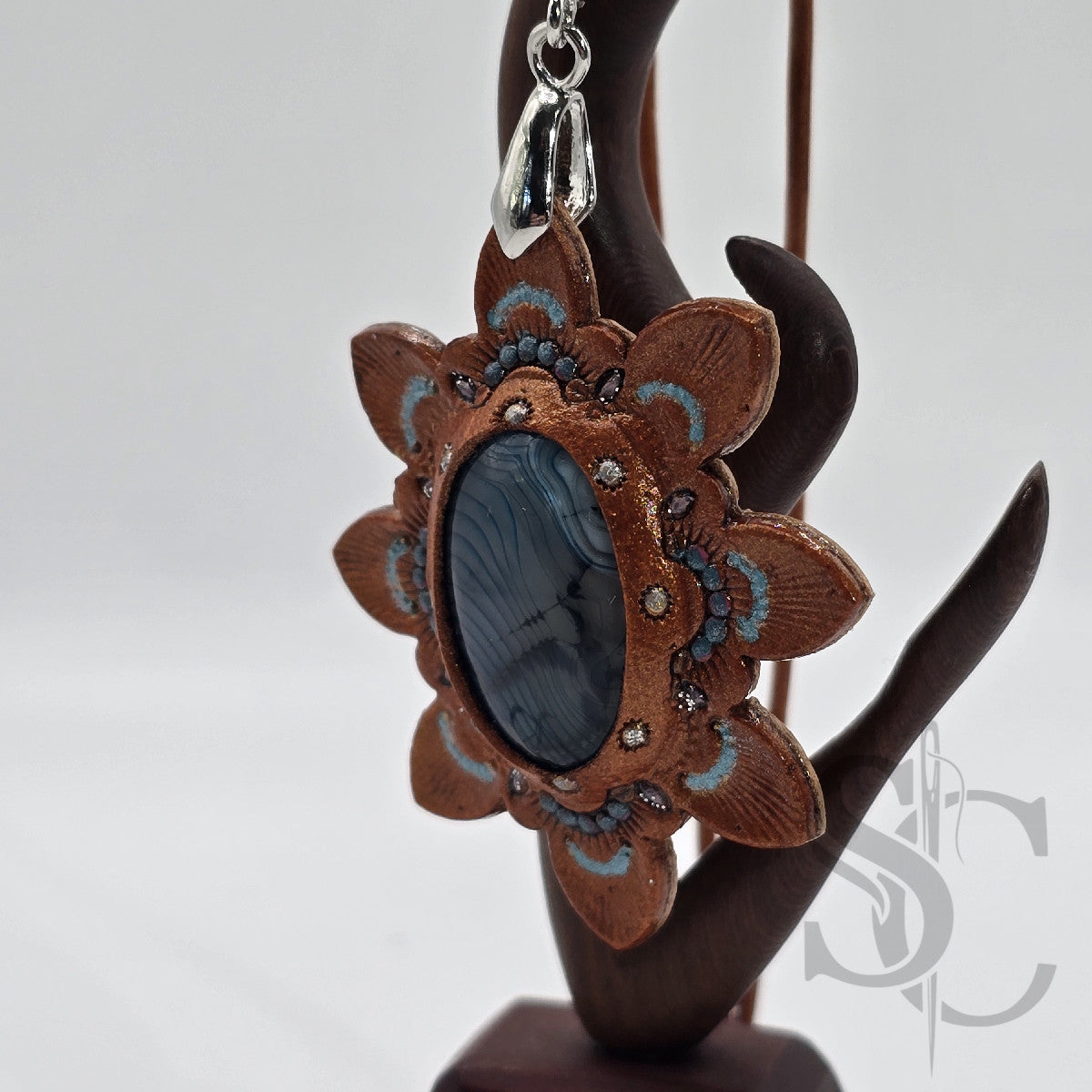 Pendentif étoile avec agate veine de dragon bleue