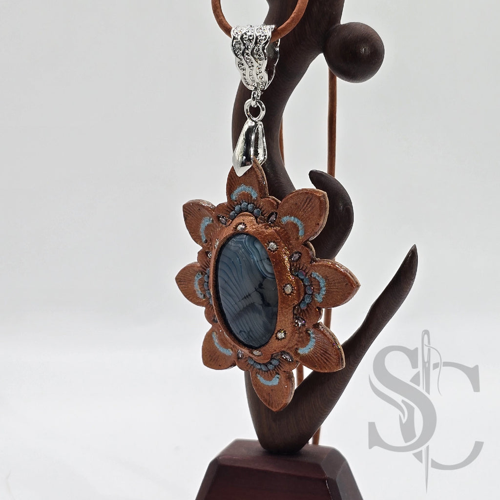 Pendentif étoile avec agate veine de dragon bleue