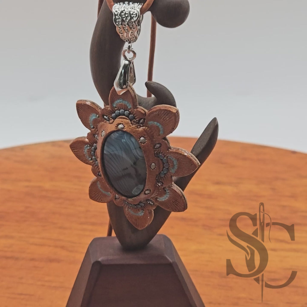 Pendentif étoile avec agate veine de dragon bleue